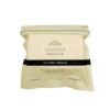 `Croxton Manor Cheddar 400g - Best British Aged Cheese in UAE buy croxton manor mature cheddar 400g uae - premium british aged cheese block on wooden board with grapes and crackers for gourmet cheese platter