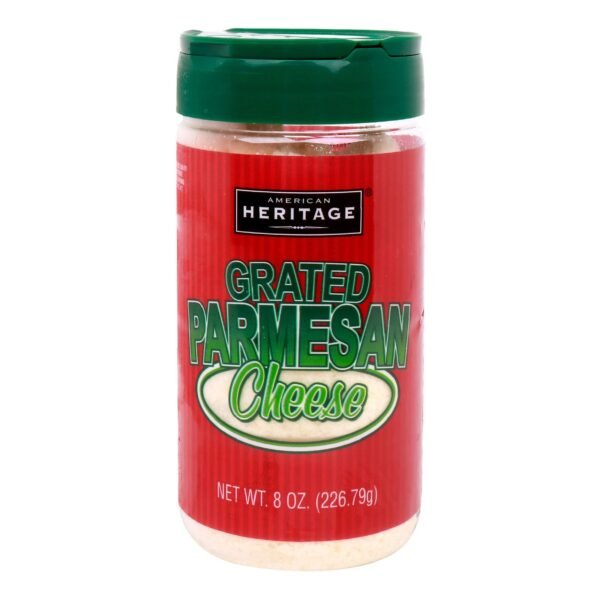 Chef using American Heritage Grated Parmesan Cheese in professional restaurant kitchen.
