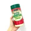 * American Heritage Grated Parmesan Cheese topping a fresh Caesar salad.
